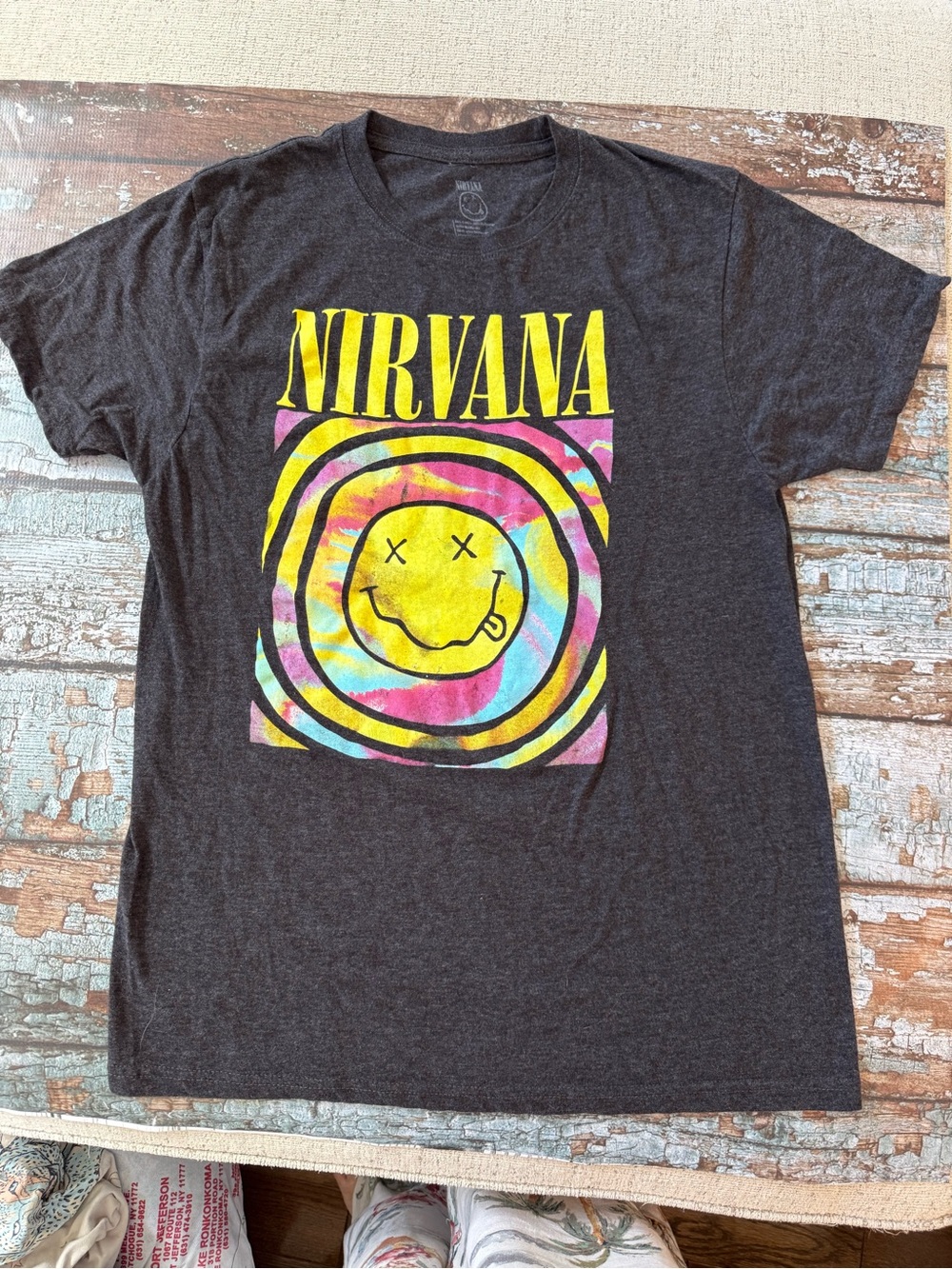 NIRVANA Charcoal Tee with Yellow Logo and Multi-Color Smiley